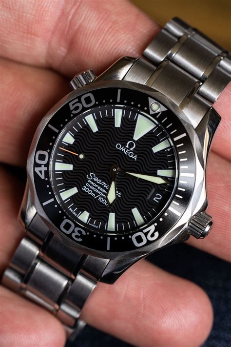 omega 36mm seamaster on wrist.